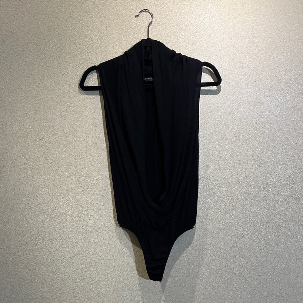 Guess by Marciano, one piece suite. Size small.